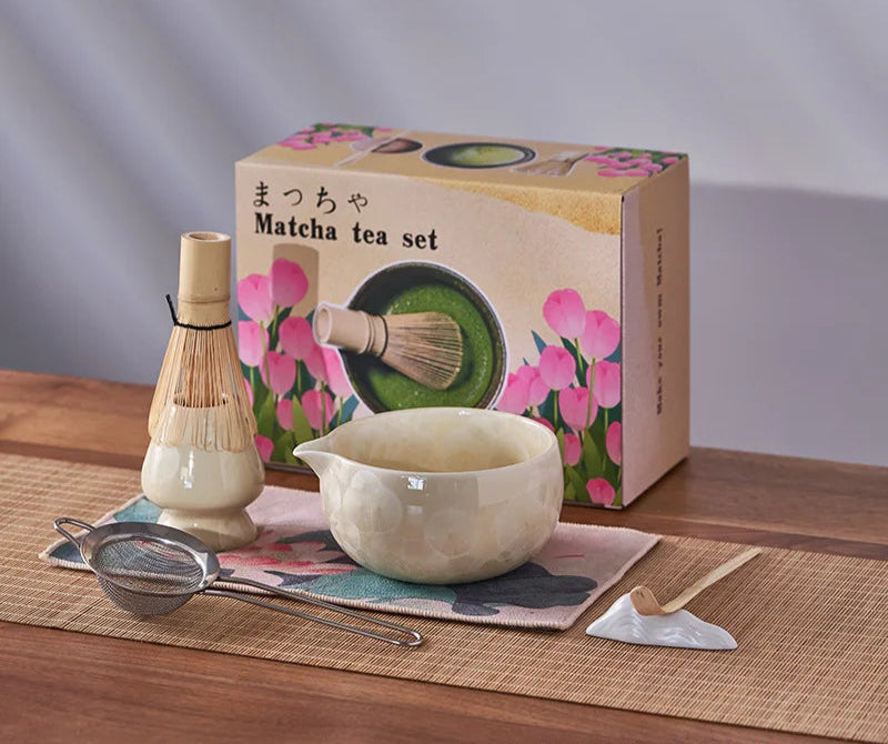 Matcha tea set with packaging on a wooden surface
