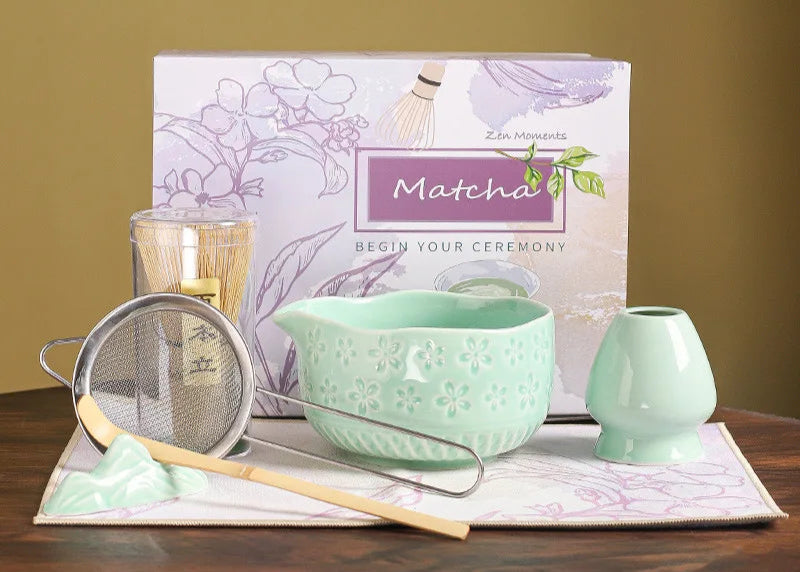 Tea-making set with a Matcha box on a wooden surface