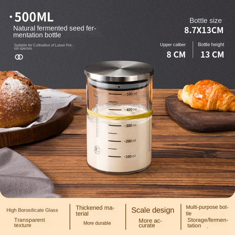 500ml fermentation seed bottle with bread and croissant on a wooden surface