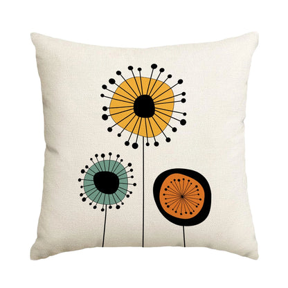 Decorative pillow with abstract floral designs on a white background