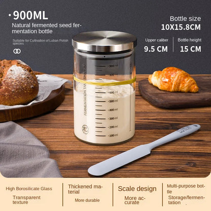 Fermentation bottle with bread and a knife on a wooden surface, featuring product details.
