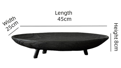 Black wooden bowl with measurements on a white background