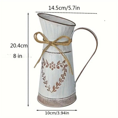 White pitcher with decorative heart design and jute bow, shown with measurements on a white background.