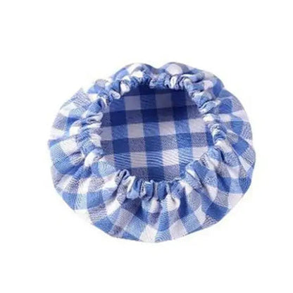 Blue and white checkered pot holder on a white background