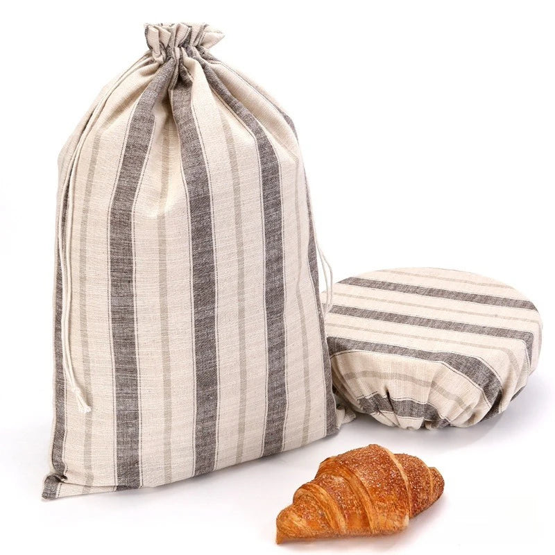 Striped bread bag with a croissant on a white background
