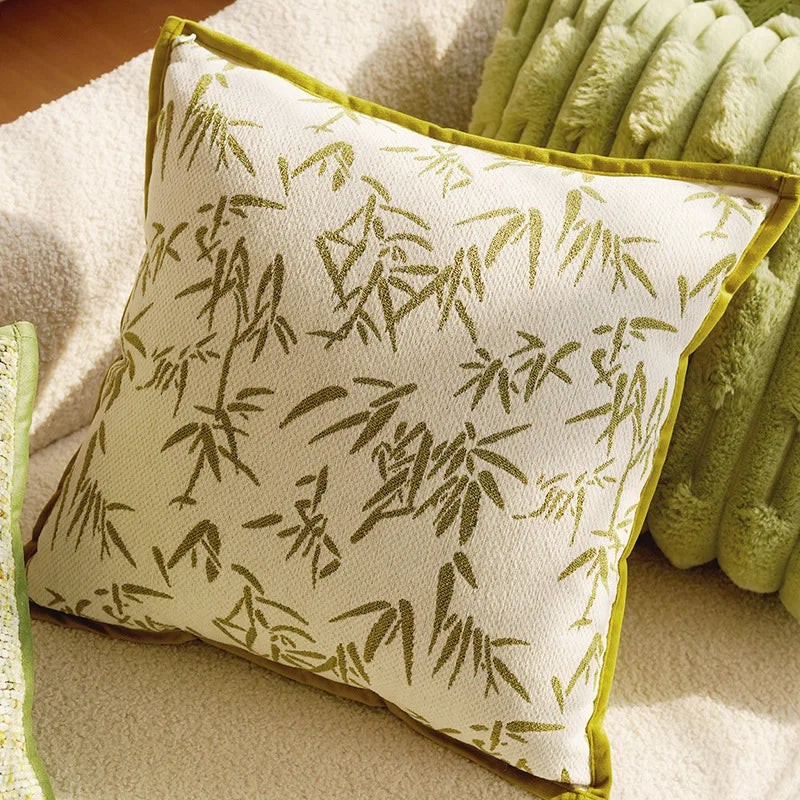 Decorative pillow with bamboo pattern on a beige background