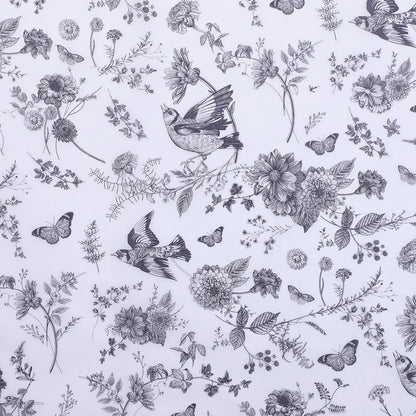 Pattern of birds, flowers, and butterflies on a light blue background