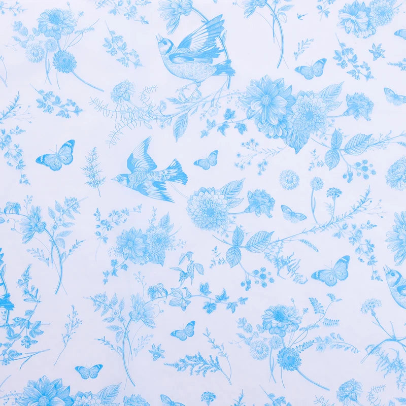 Pattern of blue butterflies and flowers on a light blue background