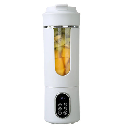 White portable blender with fruits inside on a white background