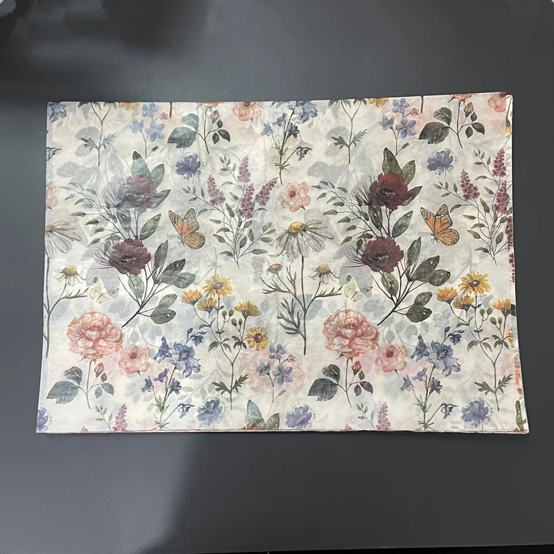 Floral patterned fabric on a dark background