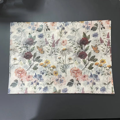 Floral patterned fabric on a dark background