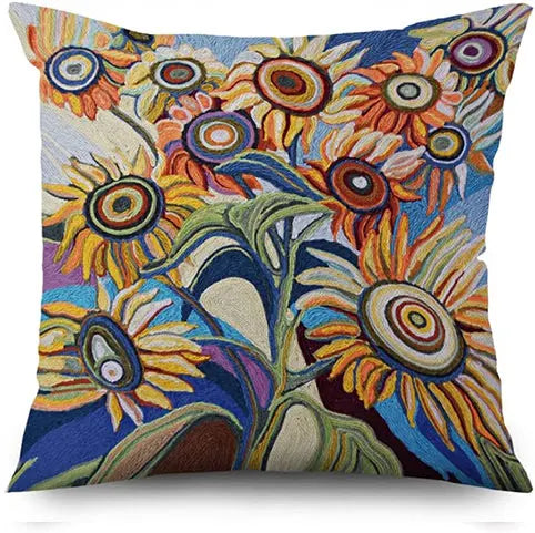 Decorative pillow with colorful sunflower pattern on a white background