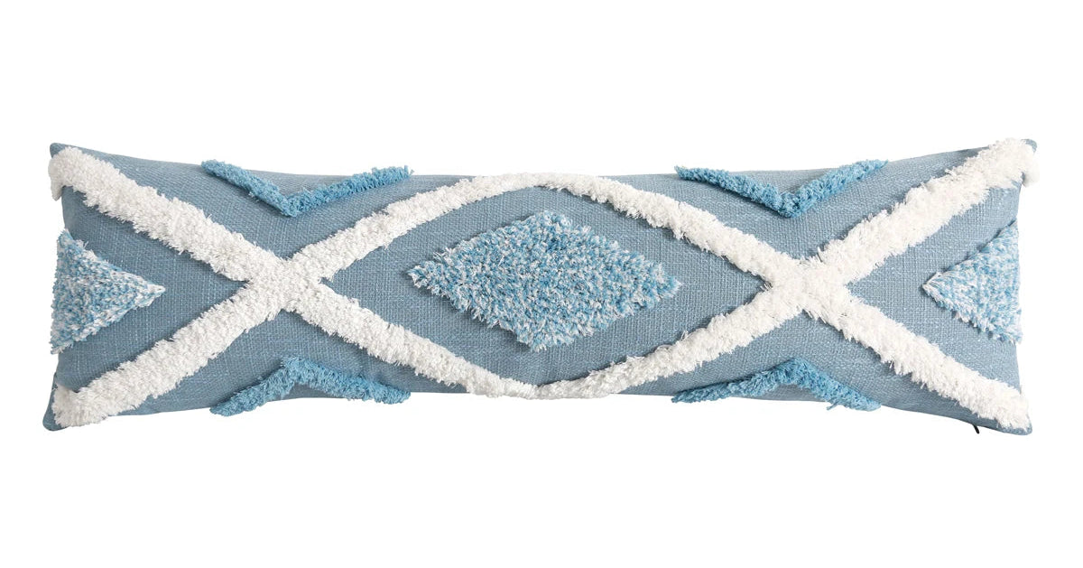 Decorative pillow with blue and white geometric pattern on a white background