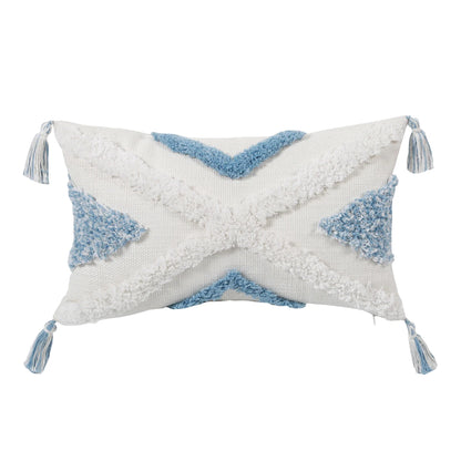 Decorative pillow with blue and white patterns on a white background