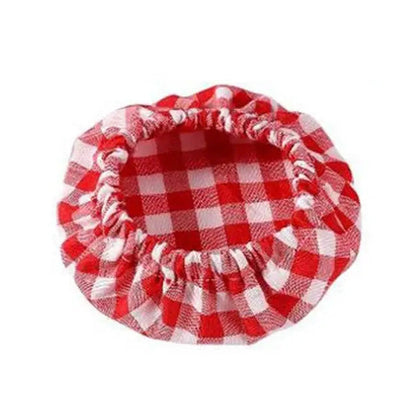 Red and white checkered pet bed on a white background