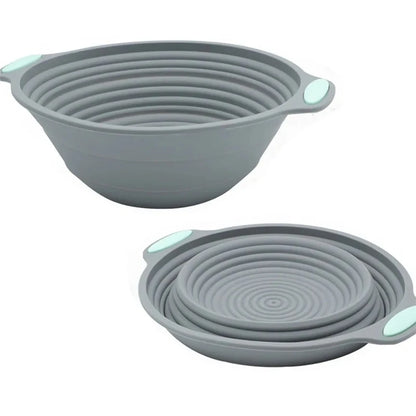 Set of two gray silicone bowls on a white background