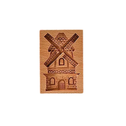 Wooden mold with windmill design on a white background