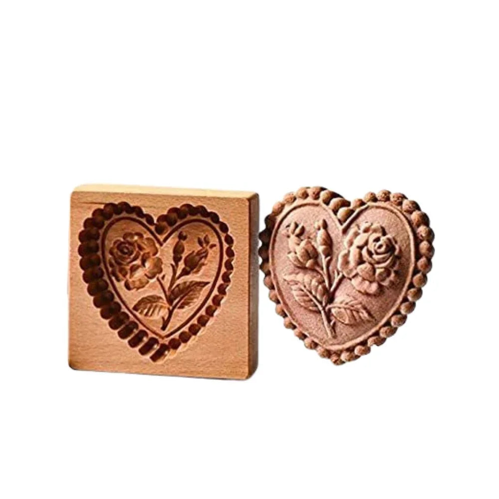Wooden stamp with heart-shaped rose design and a sample impression on a white background
