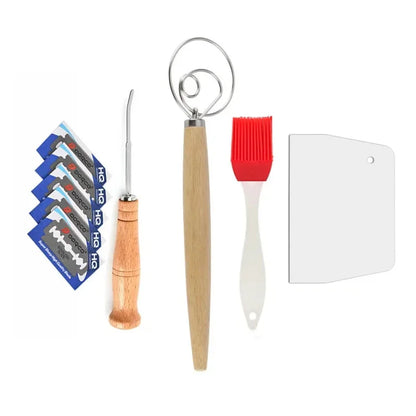 Set of kitchen utensils including a dough hook, spatula, and brush on a white background.